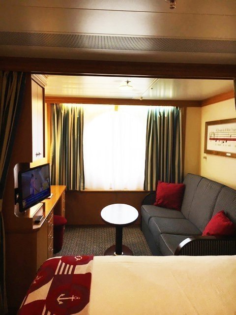 The interior of an Oceanview Stateroom onboard Disney Cruise Line
